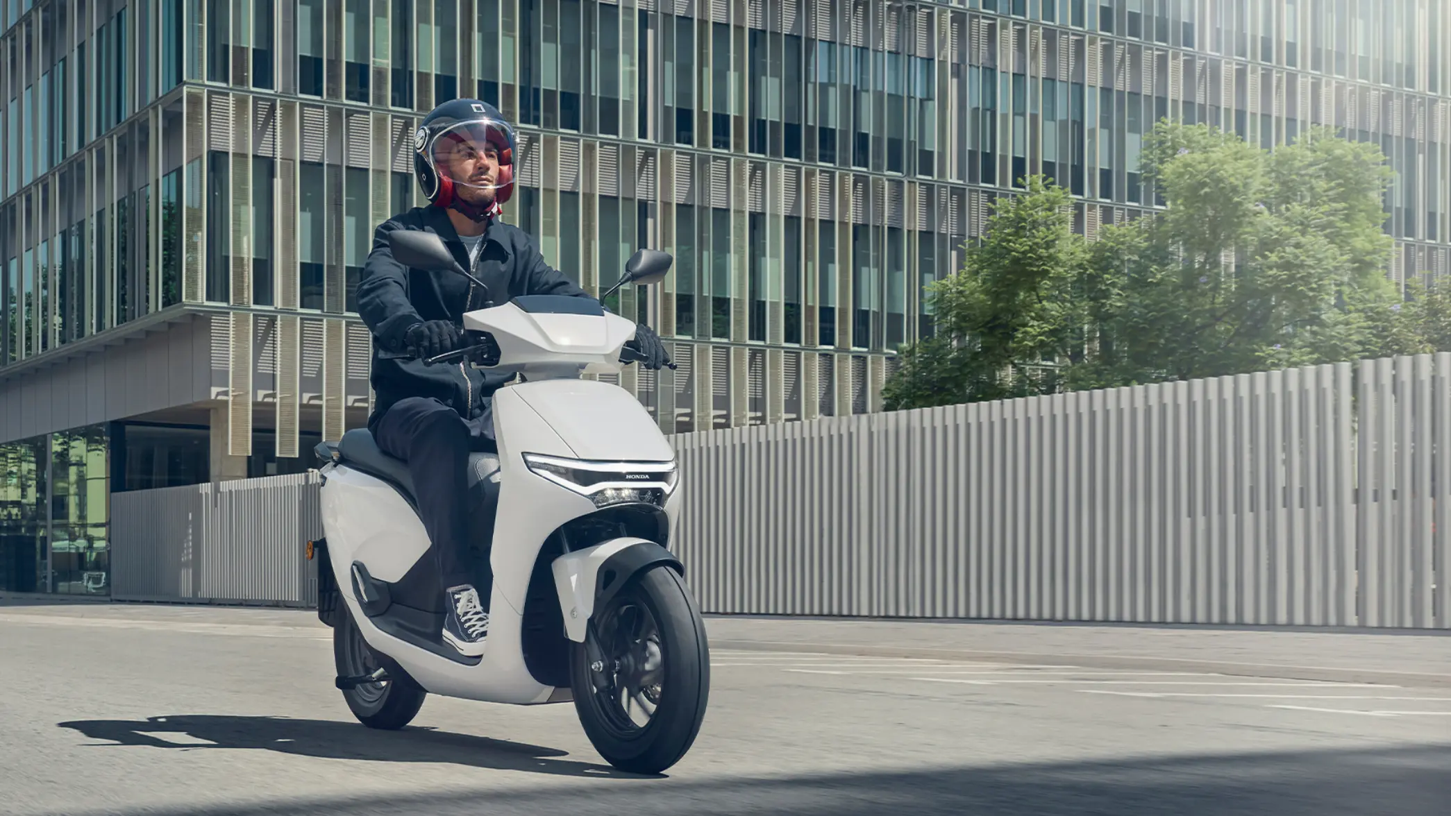 2025 CUV e: front three quarter shot with rider